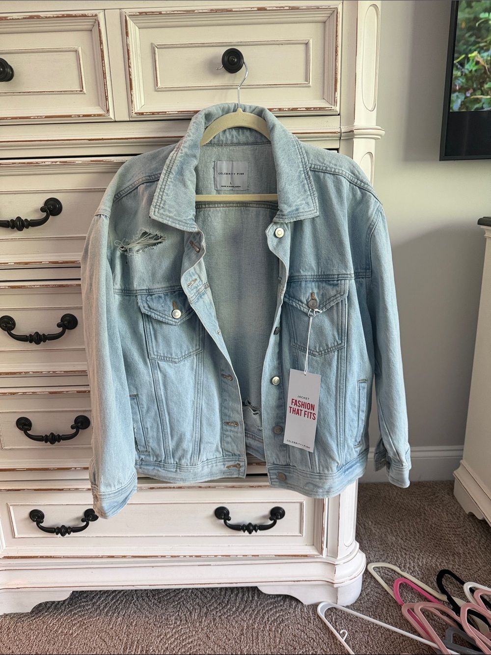 Celebrity Pink Light Wash Distressed Denim Jacket